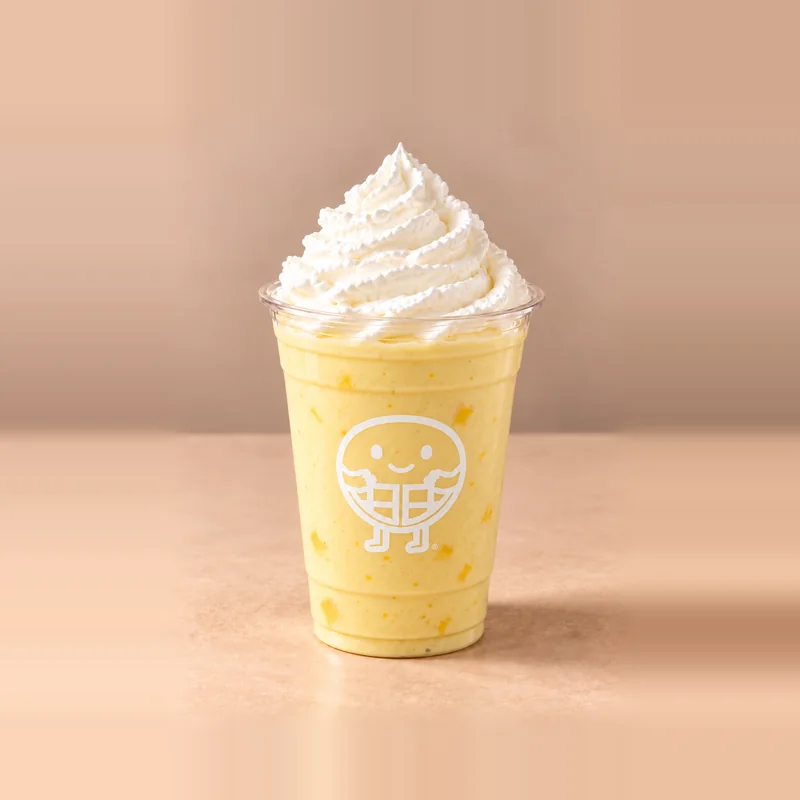 Tropical Mango Bliss: thick milkshake dessert at The Waffle Co.